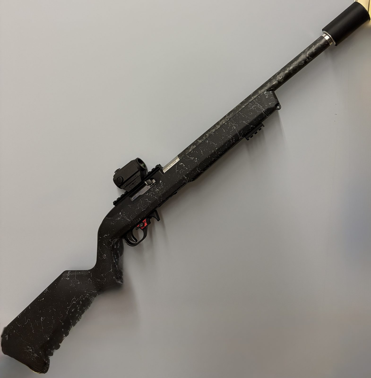 The QUARK suppressor mounted on a .22LR rifle